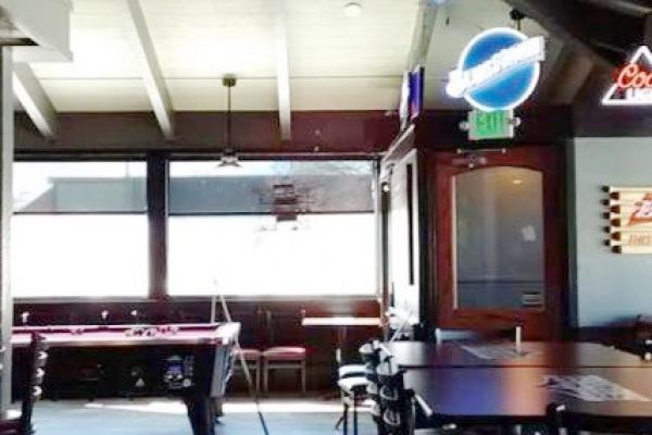 Interior of restaurant for sale in Kalispell, MT with pool table