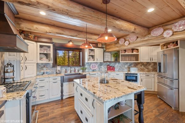 Country Kitchen with Stainless Steel Appliances and an Island