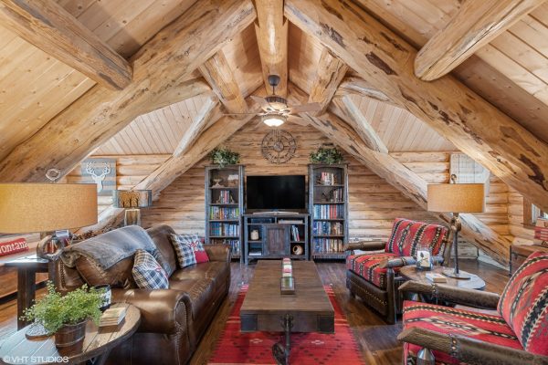 Den and Rec Room with Log Beams and Accents overlooking the Lake