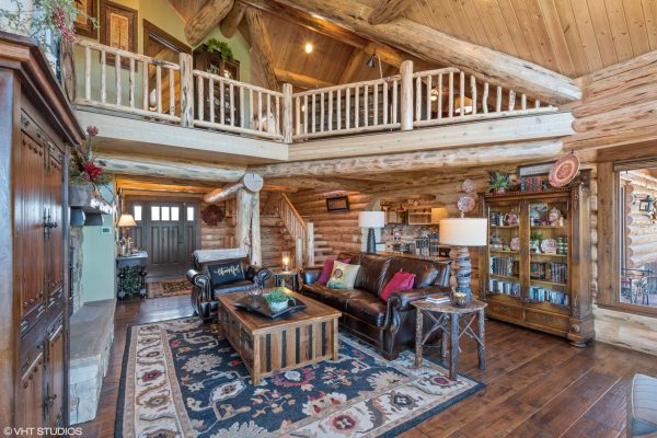 Living Room with Loft includes a Wood Staircase and Hardwood Floors